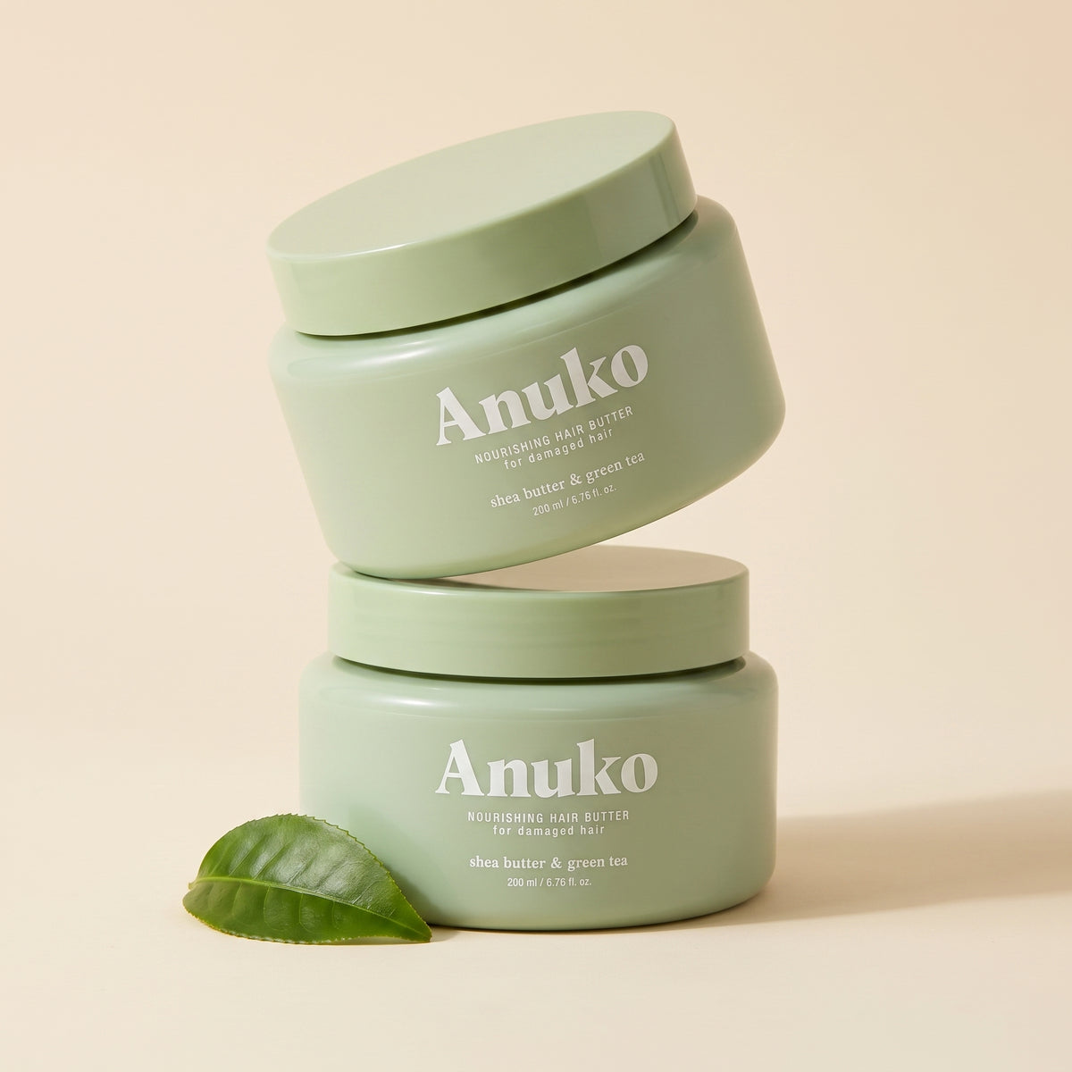 Anuko Nourishing Hair Butter 2-Pack, two stacked jars