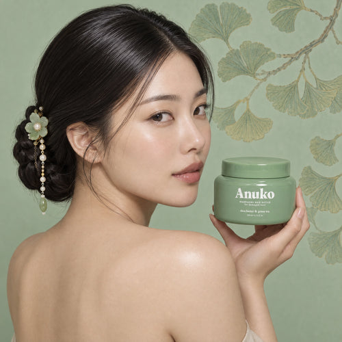 Woman with a jade-pin chignon holding the Anuko Hair Butter jar