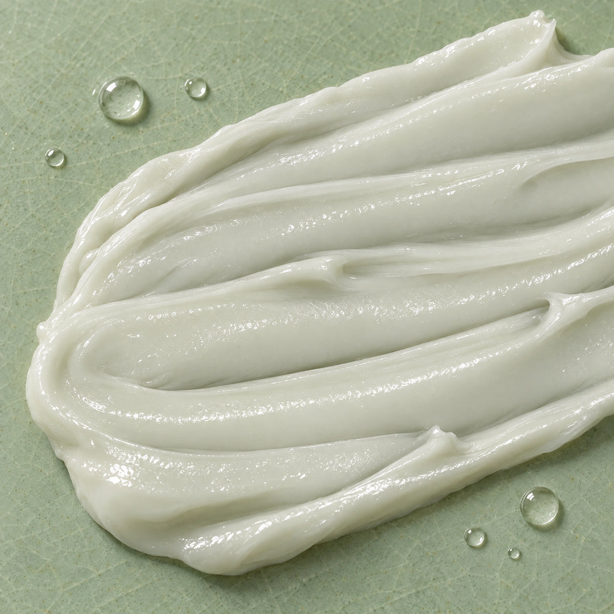 Close-up of the thick ivory Hair Butter texture